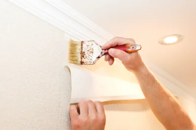 Pose de papier peint à Huêtre — revêtements muraux et toiles de verre